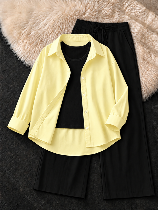 LEMON YELLOW BUTTON DOWN SHIRT , BLACK TANK TOP WITH BLACK FLAPPER TROUSER